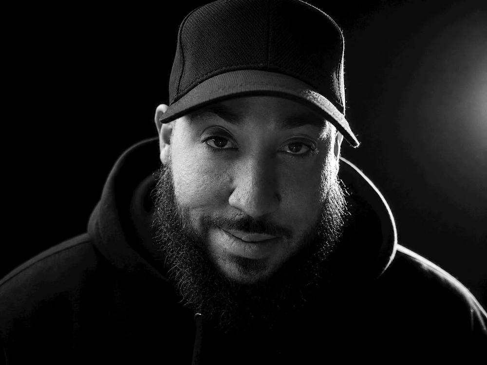 Black and white portrait of DJ Angel