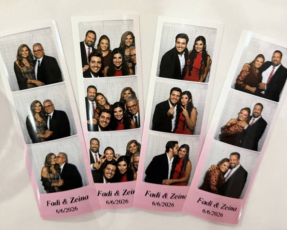 Printed photo booth strips with a custom wedding design