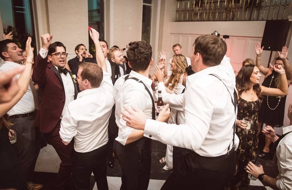 Groomsmen dancing on the floor