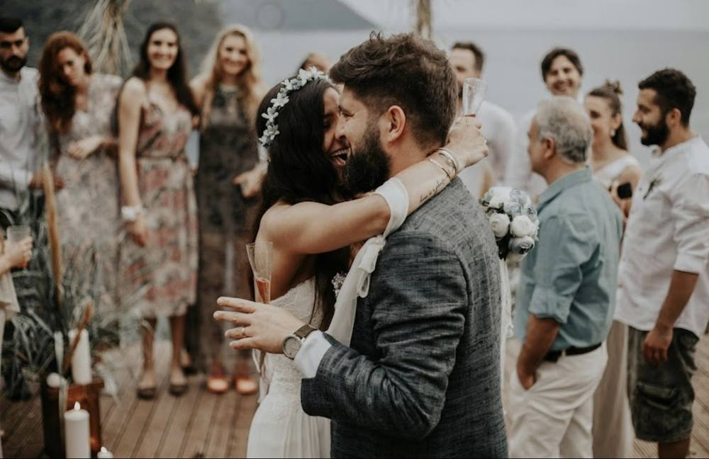 Guests hugging on the dance floor