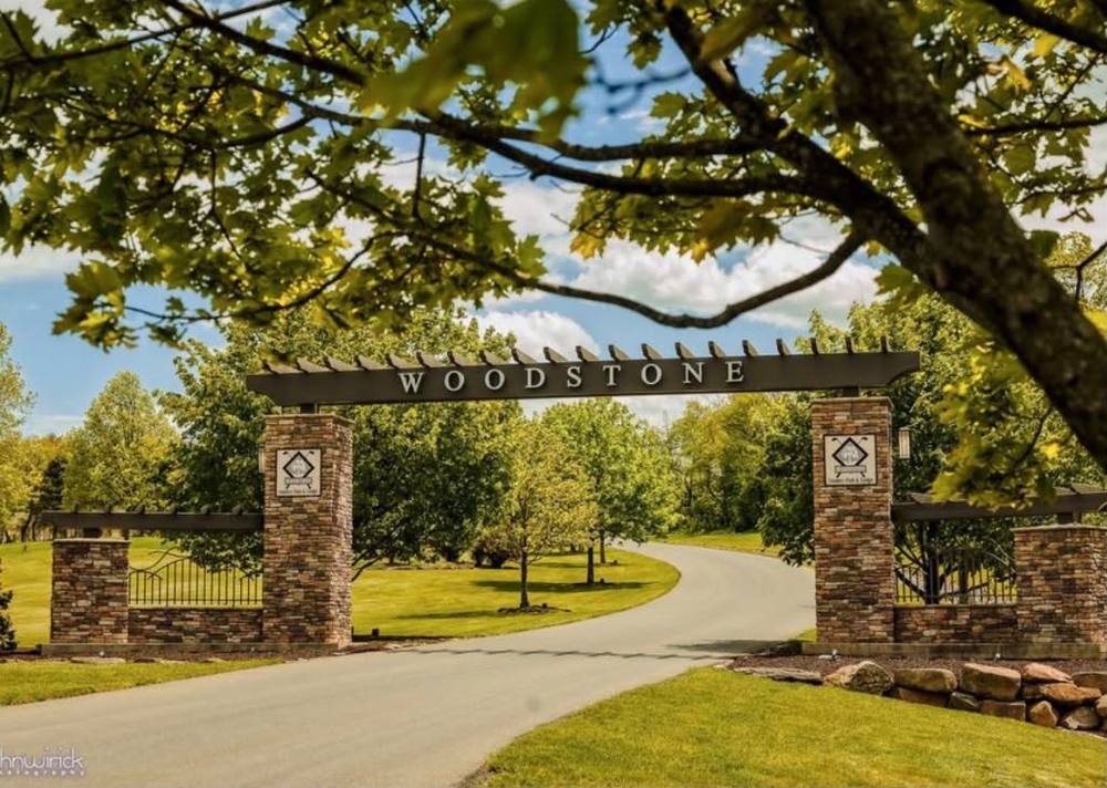 Stone entrance gate of Woodstone Country Club & Lodge
